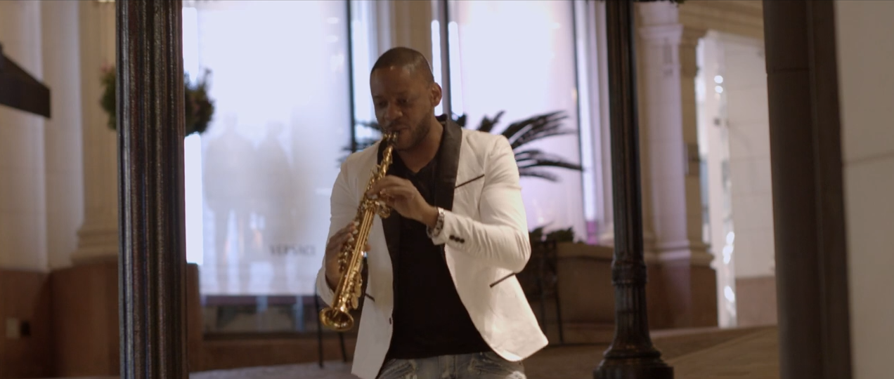 Jackiem Joyner in a white jacket